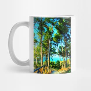 Scene from Sirolo with fenced gravelly road, tall trees, sky and sea Mug